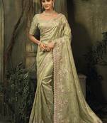 Pista green silk blend saree with embroidered jari and cut-dana work