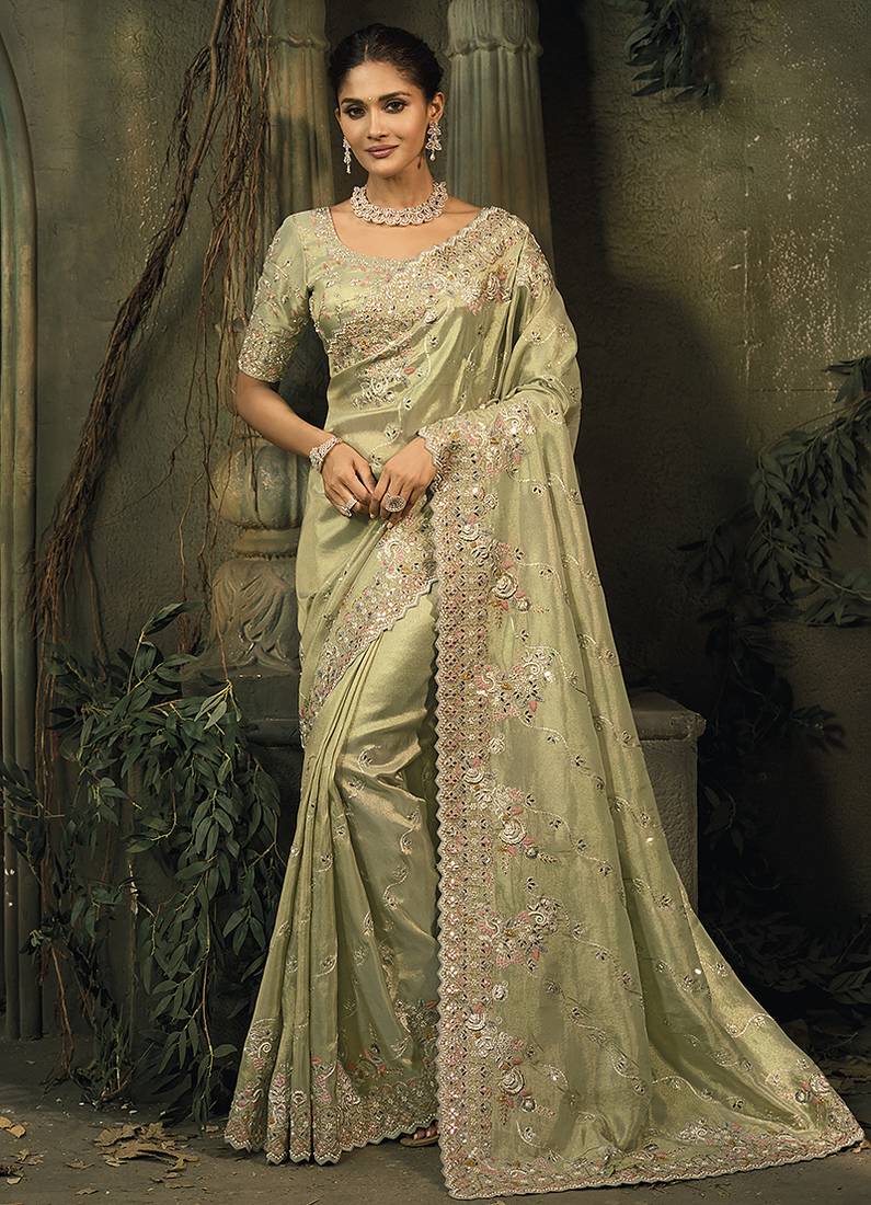 Pista green silk blend saree with embroidered jari and cut-dana work