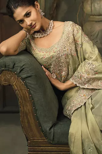 Pista green silk blend saree with embroidered zari work