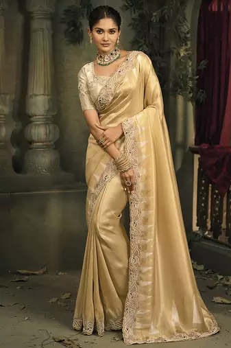 Beige silk blend saree with embroidered jari and cut-dana work