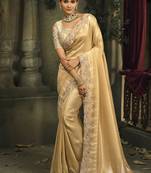 Beige silk blend saree with embroidered jari and cut-dana work
