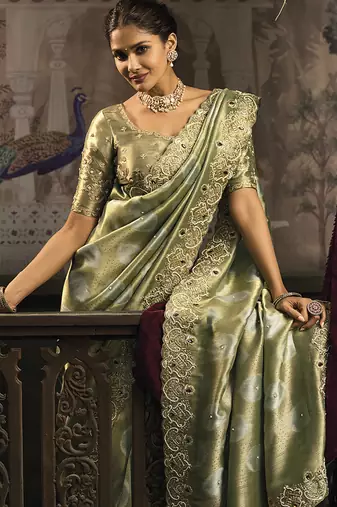 Olive green silk blend saree with embroidered zari work