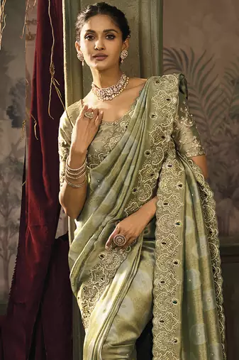 Olive green silk blend saree with embroidered zari work