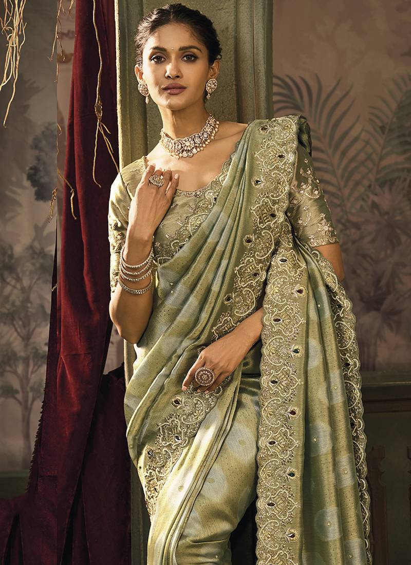 Olive green silk blend saree with embroidered jari and cut-dana work