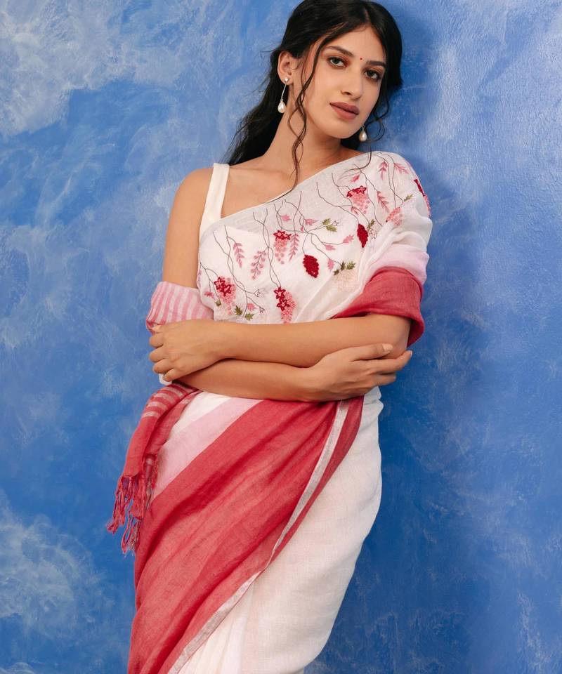 Pink handloom linen saree with hand embroidered work