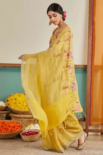 Yellow handloom linen saree with hand embroidered work