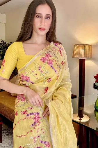 Yellow handloom linen saree with hand embroidered work