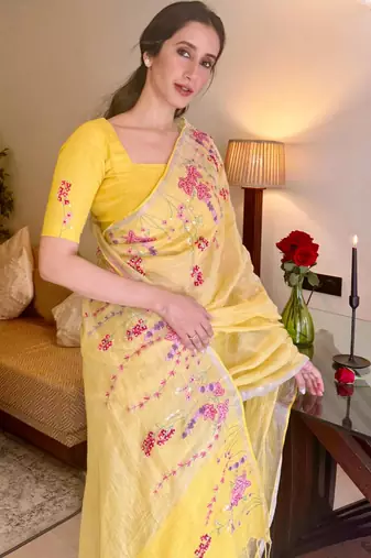 Yellow handloom linen saree with hand embroidered work