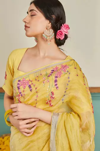 Yellow handloom linen saree with hand embroidered work
