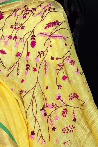 Yellow handloom linen saree with hand embroidered work