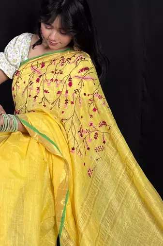 Yellow handloom linen saree with hand embroidered work