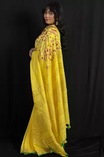 Yellow handloom linen saree with hand embroidered work