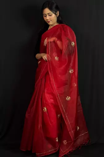Red organza saree with hand embroidered work