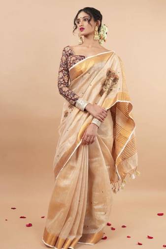 Golden tissue linen saree with hand embroidred work
