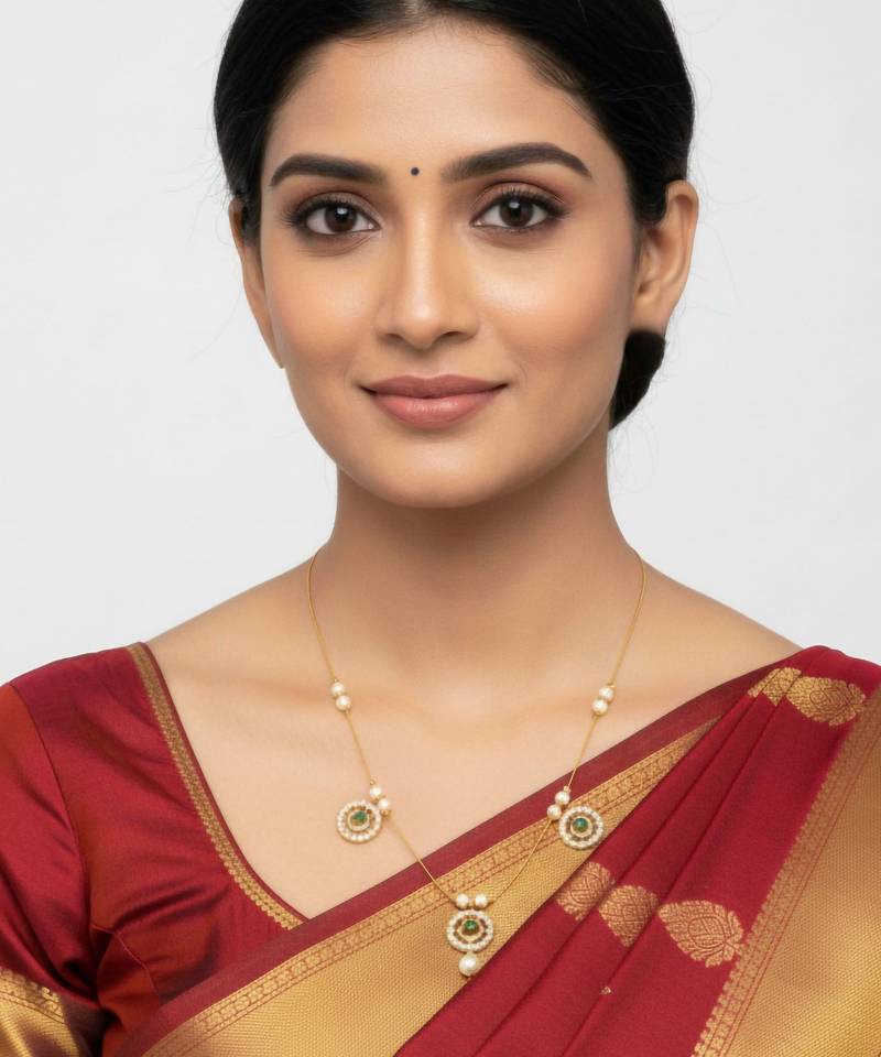 Invisible gold-plated triple pendant necklace with pearl detailing