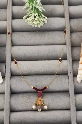 Invisible lightweight ruby bead chain necklace with gold temple pendant