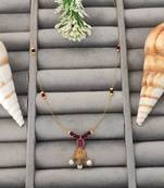 Invisible lightweight ruby bead chain necklace with gold temple pendant