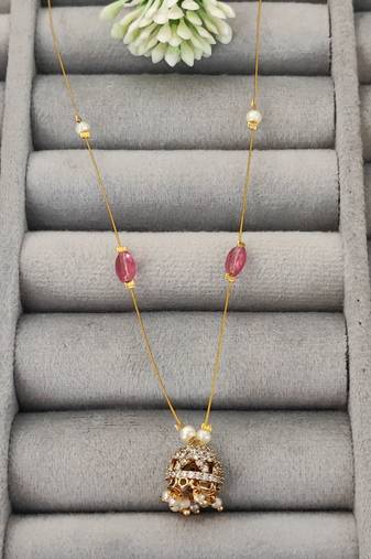 Invisible gold-plated jhumka pendant necklace with pink beads