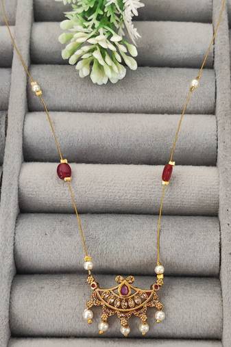 Invisible gold-plated pendant necklace with ruby beads and pearl drops