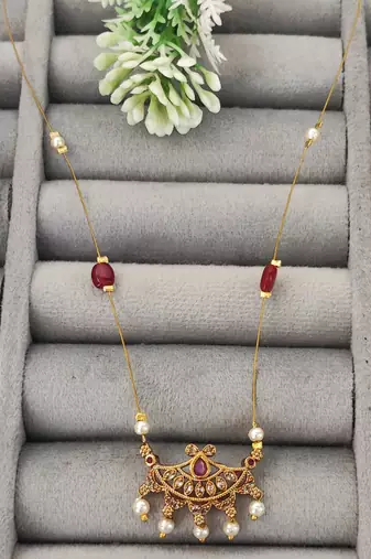 Invisible gold-plated pendant necklace with ruby beads and pearl drops