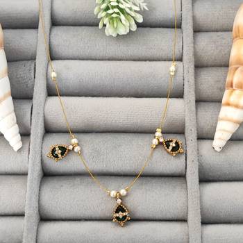invisible gold-plated green pendant necklace with stone detailing 1