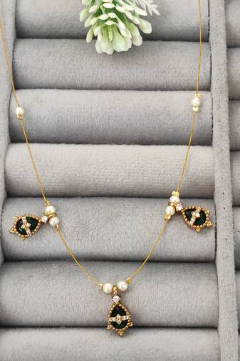 Invisible gold-plated green pendant necklace with pearls for festive wear