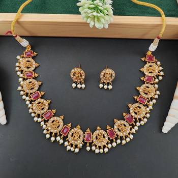 traditional lakshmi coin necklace set with ruby accents 1