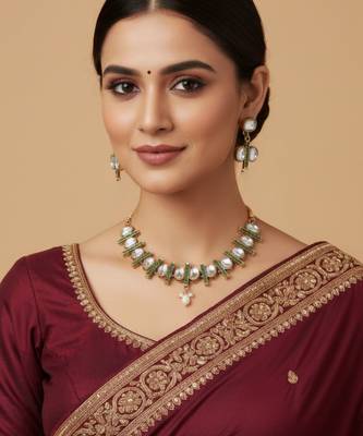 kundan necklace set with green accents and pearl detailing 2