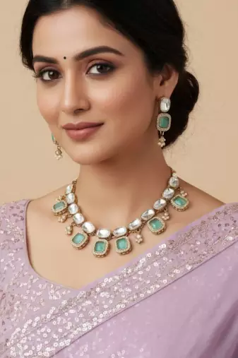 kundan style necklace set with emerald green stones