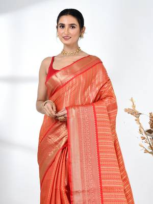 orange brocade saree with intricate borders 5