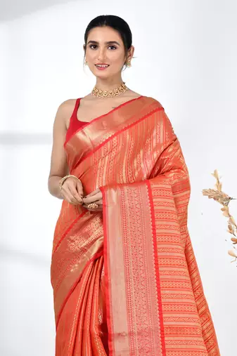 orange brocade saree with intricate borders