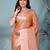 elegant orange tissue saree with intricate border