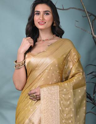 elegant yellow tissue saree with intricate border 5