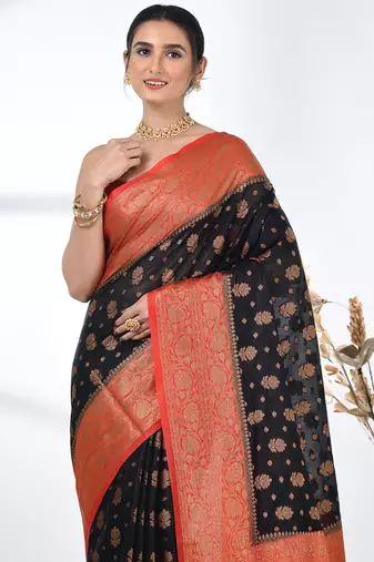 black georgette saree with red and gold border