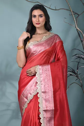 red tissue saree with gotapatti detailing and elegant border