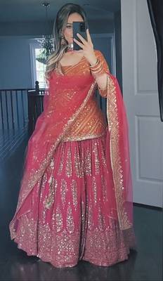 Orange and pink faux georgette embroidered Lehenga Choli 1