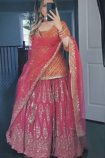 Orange and pink faux georgette embroidered sharara suit
