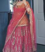 Orange and pink faux georgette embroidered sharara suit