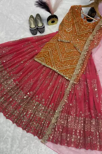 Orange and pink faux georgette embroidered Lehenga Choli