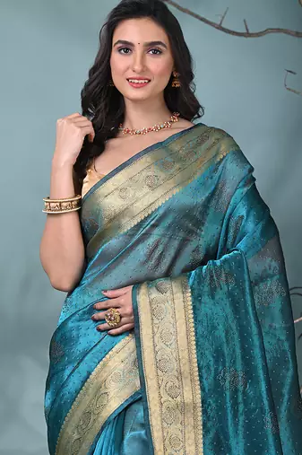 sapphire blue tissue saree with stone detailing