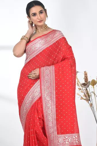 red georgette saree with silver border and detailing
