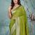 elegant green georgette saree with intricate silver zari work