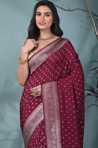 elegant fuchsia georgette saree with intricate silver zari work