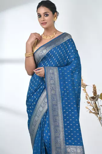 elegant sky blue georgette saree with intricate silver zari work