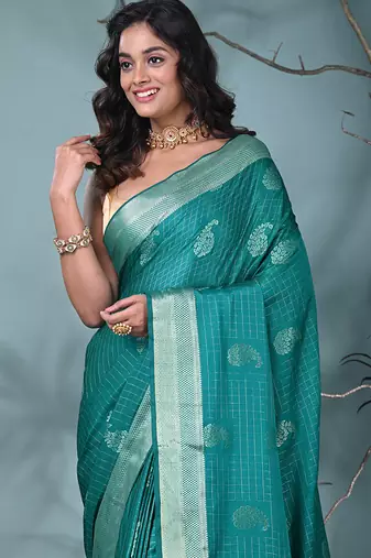 elegant teal silk blend saree with intricate brocade work