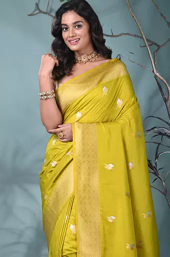 graceful lime green silk blend blend saree with intricate zari work