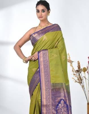 glamorous lime green south silk blend saree with intricate zari border 5