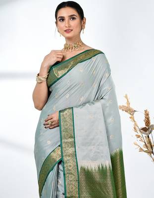 elegant mint green south silk blend saree with green zari border 5