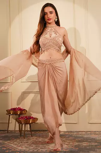 Beige crepe drape skirt set with heavy hand embroidered halter blouse and dupatta