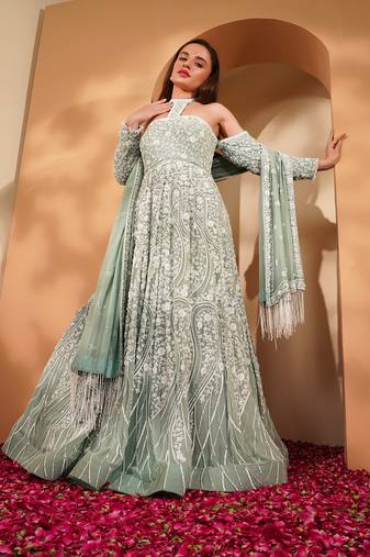Teal georggete gown dupatta with white sequin and cut dana work .